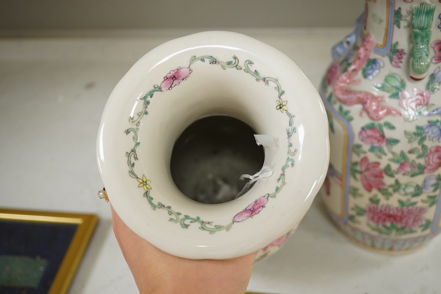 A pair of Chinese famille rose vases, 30cm high